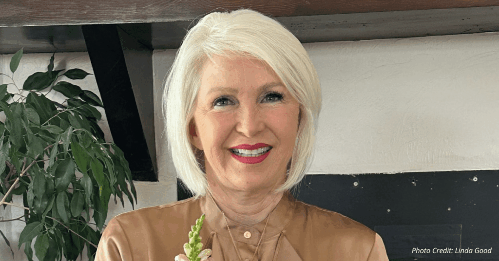 Portrait of former Mesa County Clerk Tina Peters smiling in indoor setting