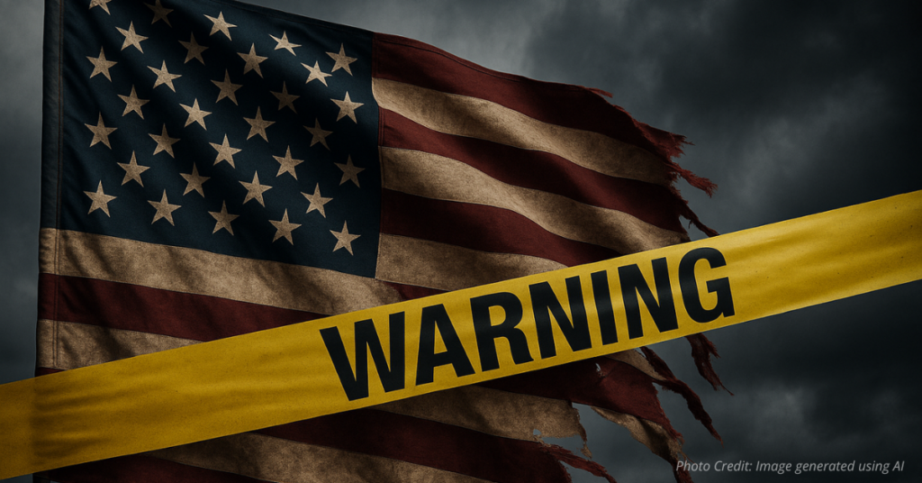 Torn flag with caution tape representing national threat