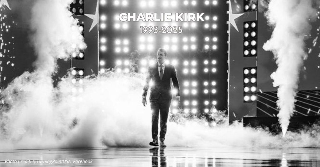 Charlie Kirk walks on-stage