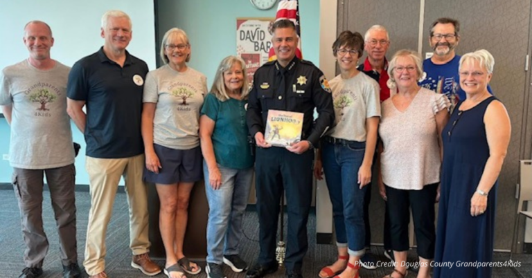 Douglas County Grandparents4Kids members with Sheriff Darren Weekly at library story hour