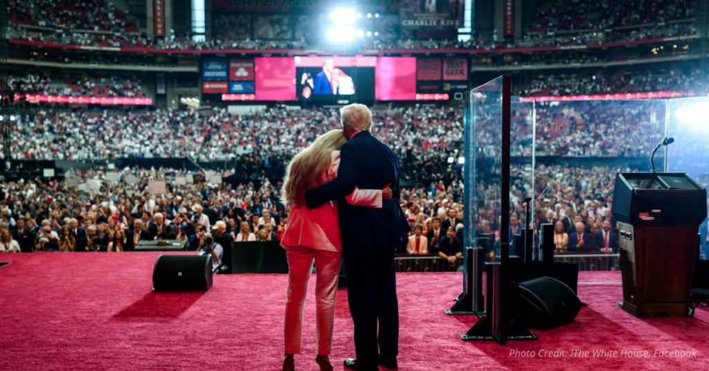 Erika, Kirk, and Donald Trump on stage.