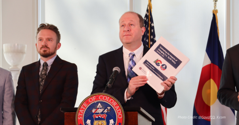 Jared polis hold State of Colorado report