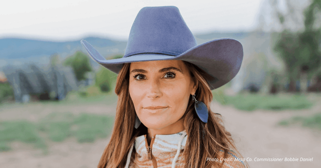 Mesa County Commissioner Bobbie Daniel in a cowboy hat outdoors