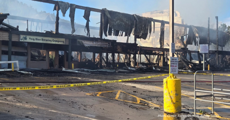 Fire destroys Nederland's business district.