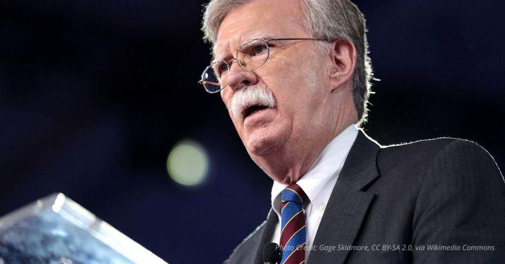 John Bolton speaking at CPAC 2017 in National Harbor, symbolizing his prominence before facing criminal scrutiny