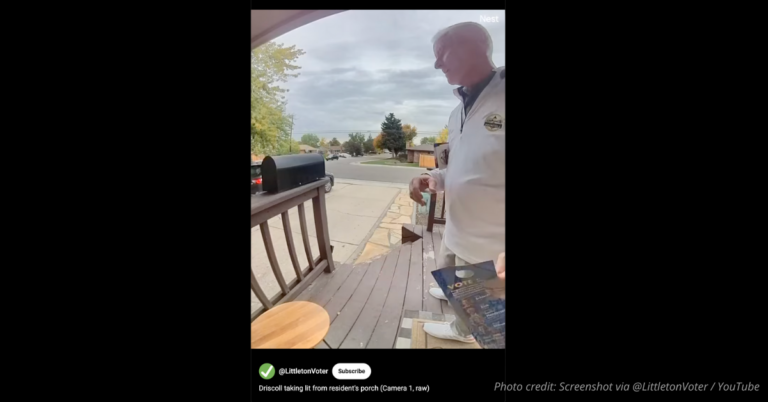 Littleton mayoral candidate Patrick Driscoll seen taking campaign flyer from resident’s porch