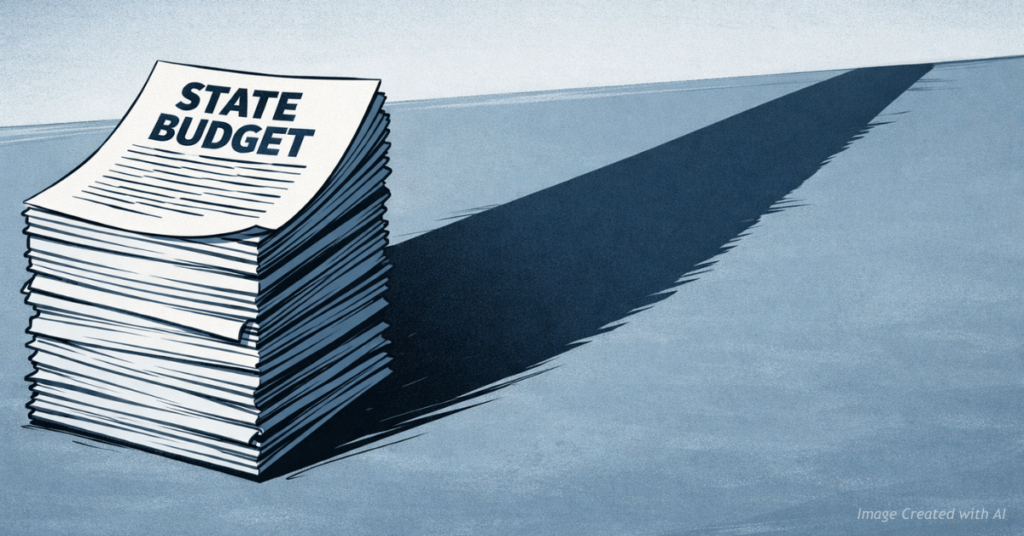 Illustrated budget documents casting a shadow