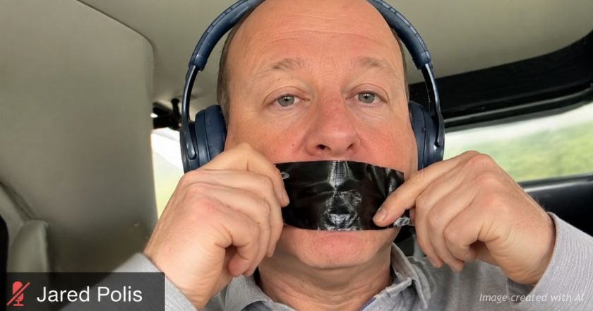 Polis Responds To Peters Controversy With Taped Mouth Protest